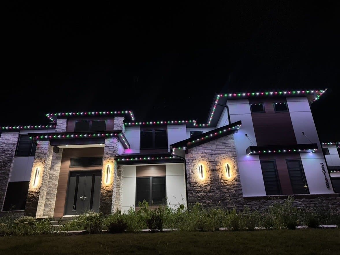 Modern stucco home in Plainfield, IL with color-changing permanent lights